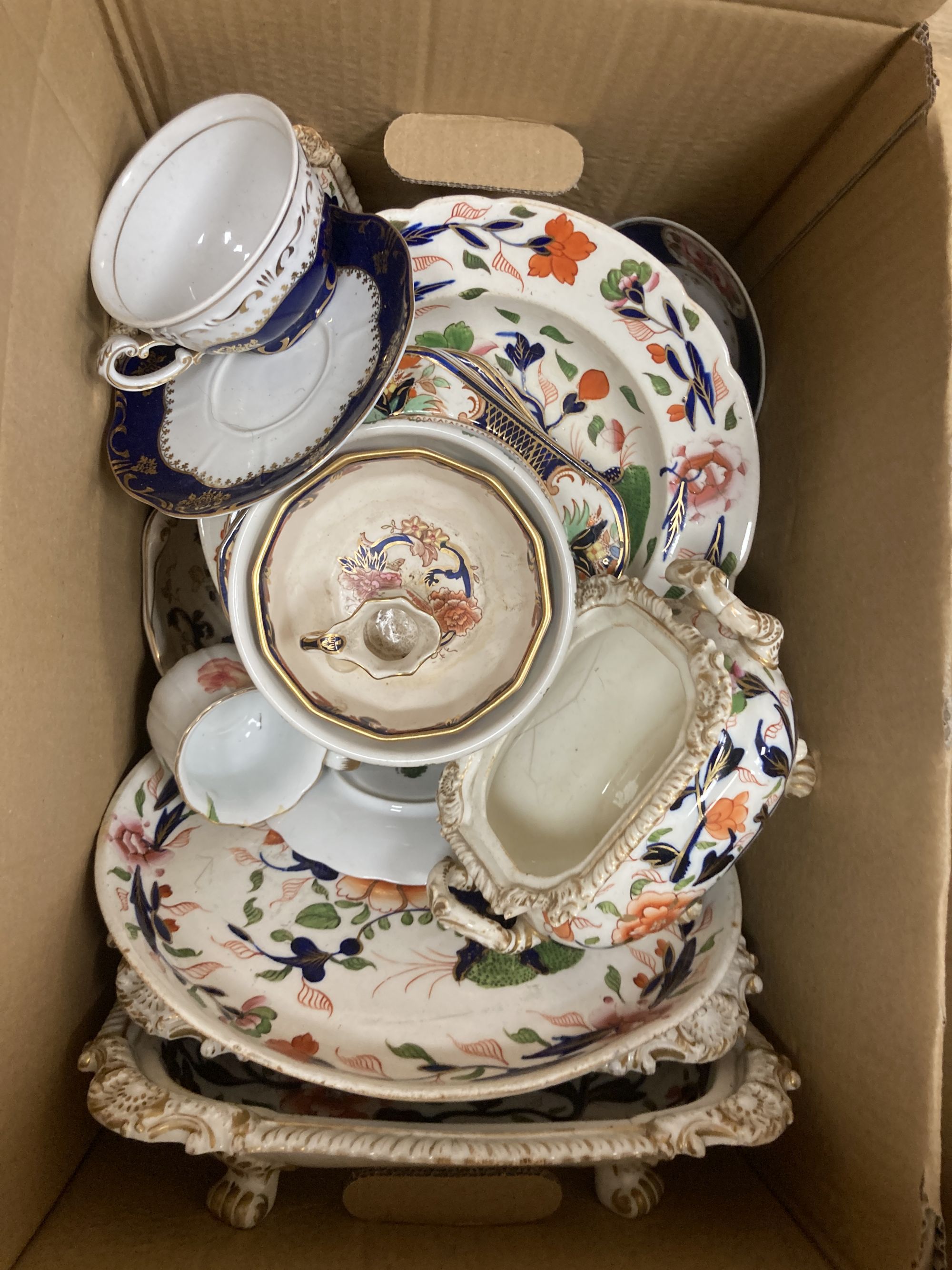 An early 19th century Staffordshire pottery part dinner service, including a large meat dish